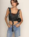 Polka dot mesh cropped tank top
Cascading ruffles
Sheer lace pane
V-neckline
Sleeveless
polka dot crop top
going out top