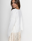white Knit long sleeve cardigan
Rolled collar
Button down closure
Unlined
ivory cardigan
