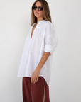 white Woven oversized button down shirt
Collar neckline
Long sleeves with button closures
Front button down closure
Unlined
Cotton/Nylon/Spandex