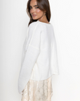 white Knit long sleeve cardigan
Rolled collar
Button down closure
Unlined
ivory cardigan
