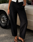 black Mid rise barrel pants
Hook/zipper closure
No waistband
Side pockets
Unlined