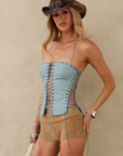 BLUE Faux leather corset
Halter neck
Adjustable neck tie
Eyelet detailing
Front lace up
