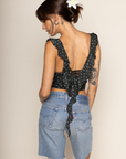 Polka dot mesh cropped tank top
Cascading ruffles
Sheer lace pane
V-neckline
Sleeveless
polka dot crop top
going out top