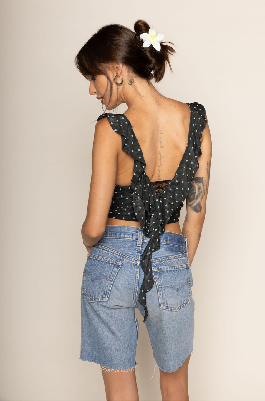 Polka dot mesh cropped tank top
Cascading ruffles
Sheer lace pane
V-neckline
Sleeveless
polka dot crop top
going out top