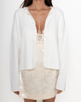 white Knit long sleeve cardigan
Rolled collar
Button down closure
Unlined
ivory cardigan