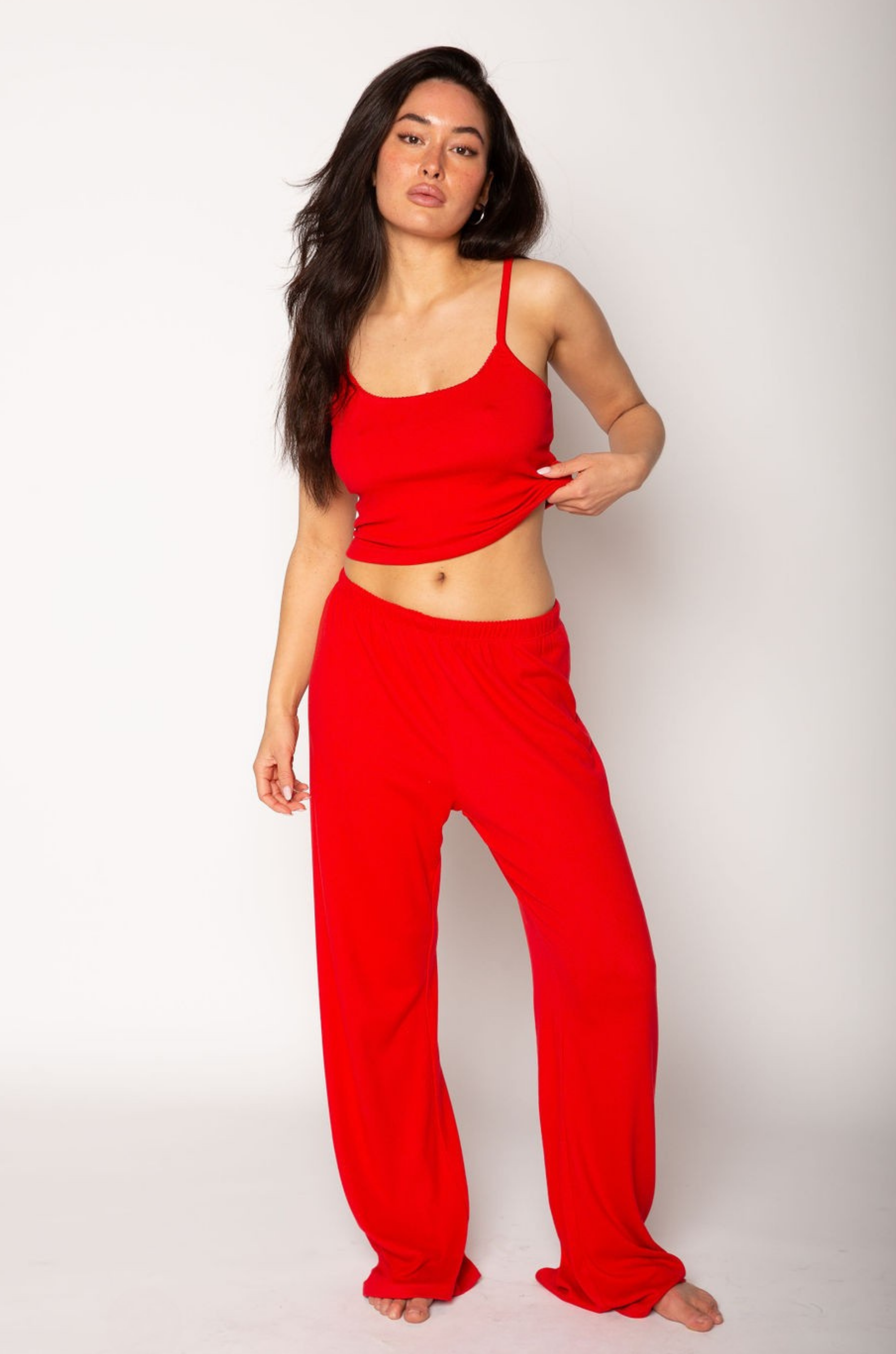 Soft knit pants. Elastic waistband. Unlined. red loungewear pants. soft lounge pants. valentines day outfit. valentines day loungewear
