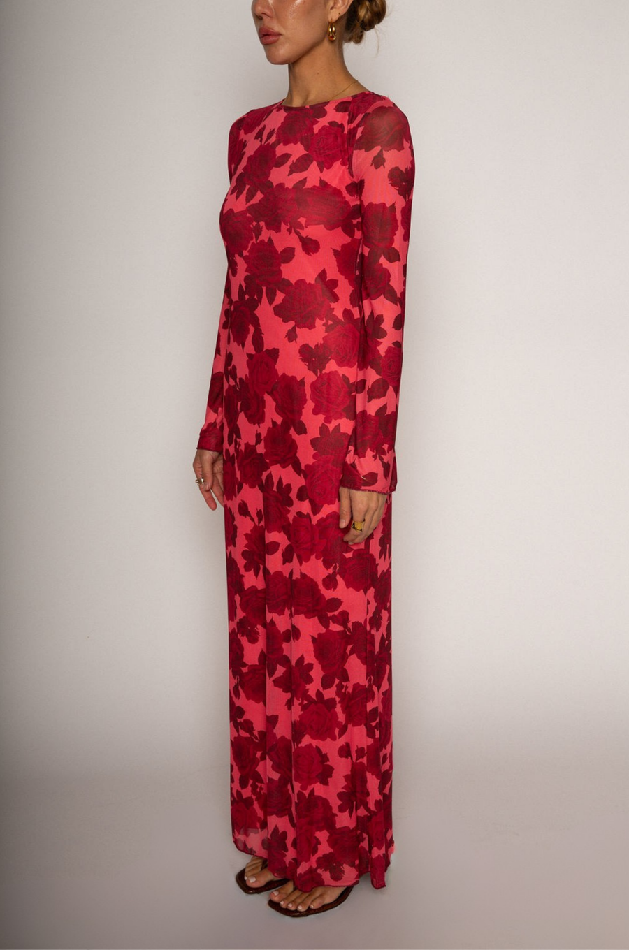Floral printed knit mesh maxi dress. Long sleeves. Back keyhole with button closure. Fully lined. wedding guest maxi dress. floral maxi dress. red floral maxi dress. sheer maxi dress