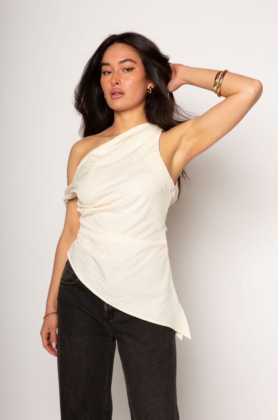 Woven top. Fixed straps. Twist strap. Ruched side. Asymmetric hem. Unlined. cream linen top. asymmetrical top. summer top. resort wear. beach vacation. 