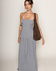 black and white Gingham printed strapless maxi dress
Drop waist
Back zipper closure
Bust is lined
gingham wedding guest dress
tube top maxi dress