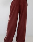 burgundy maroon Stipe wide leg pant
Grey pant with white stripe
Single bonding at side
Elastic waistband
Side pockets
Unlined
fall transition outfit