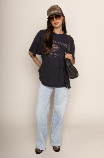 High rise flare leg jean
Button and zipper fly
Five pocket construction
Raw hem
Seamed details
Unlined