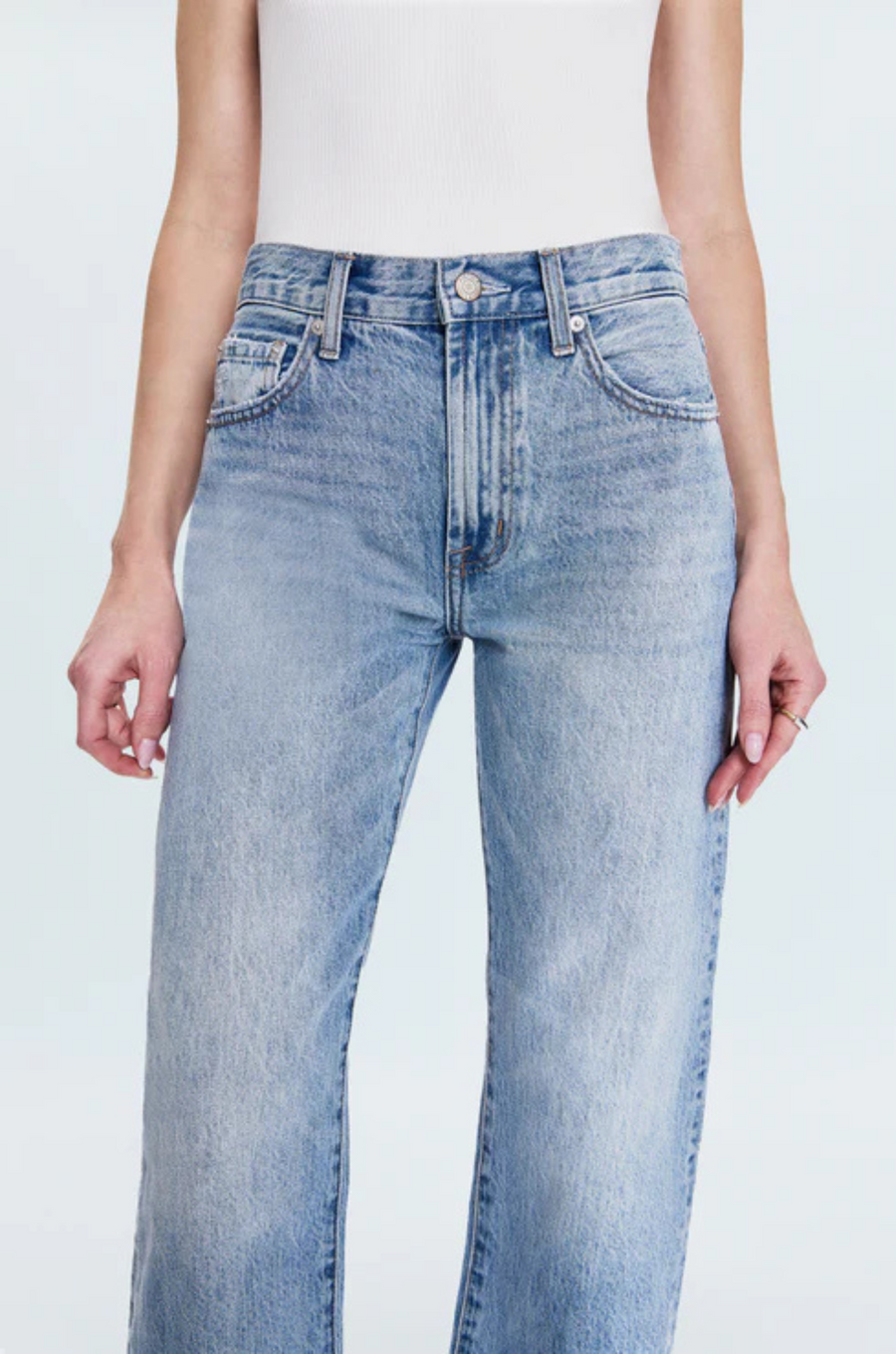Faded straight leg jeans
Mid rise bowed straight leg jeans
No stretch
Button and zipper fly
Five pocket construction
Rise: 10" / Inseam: 29" / Leg Opening: 17.5"
Cotton
mid to light wash denim jeans