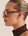 Oversized square sunglasses
Featuring striking yellow lenses paired with a contrasting tortoiseshell frame
Acetate frame
100% UV protection
Gold foil style detailing on inner right arm
Width: 12.9cm / Lens Heigh: 3.67cm / Arm Length: 14cm / Nose Bridge: 1.9cm