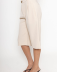 Pleated trouser jorts
Longline shorts
2 side pockets
2 faux back pockets
Button and fly closure
tan jorts
tan trouser jorts
trendy jorts
fall transition outfit