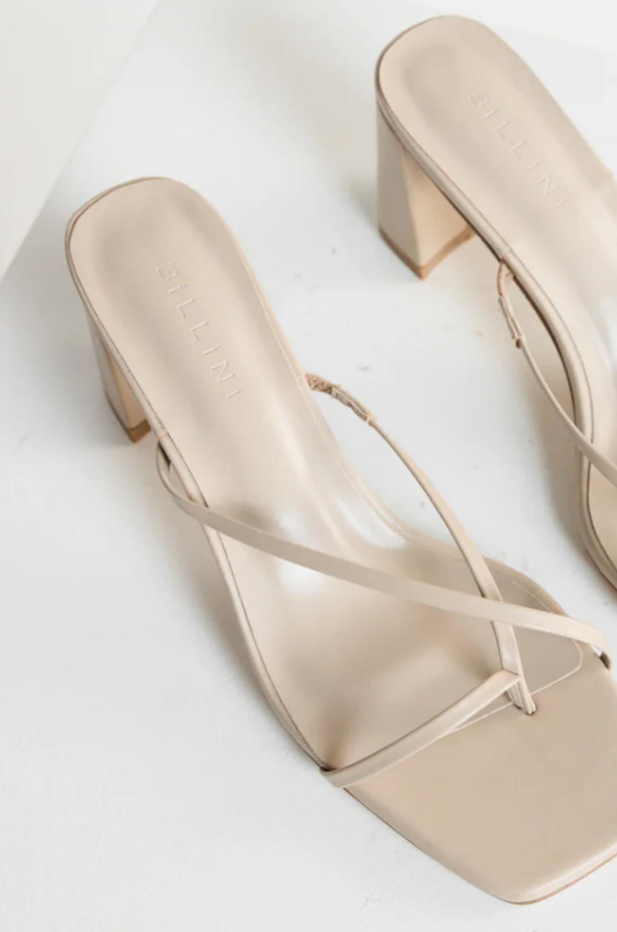 cream stone Cross over strap heels
Squared toe
Block heel