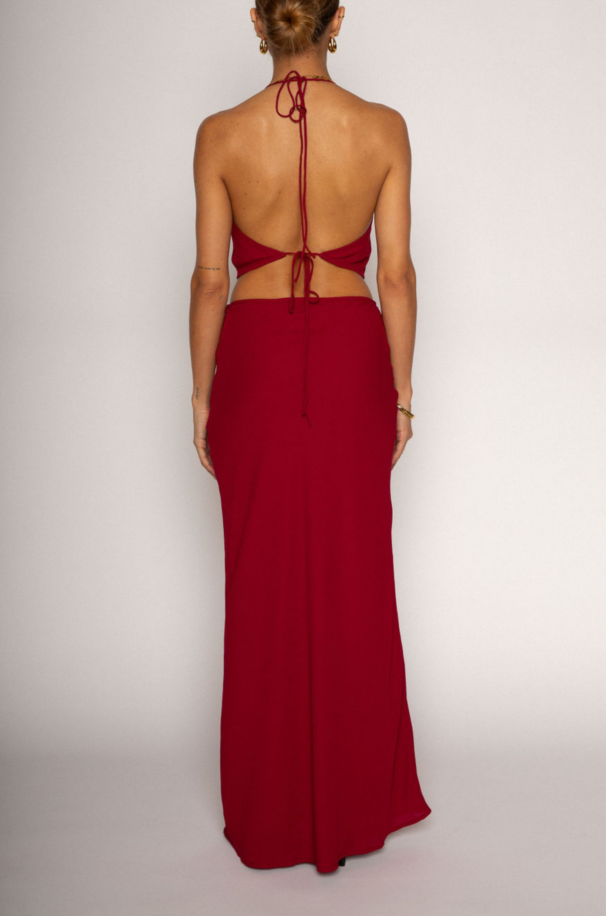 Halter crop top. Adjustable neck and back tie strap. Cowl neck. Partially lined. Maxi skirt. Hidden side zipper. Lined. red skirt set. cherry red skirt set. going out set. nice dinner set. summer outfit. spring outfit.