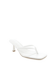 Xami is the perfect casual thong heel that will get you from work to the weekend. This on-trend style will be the perfect addition to your wardrobe.

low kicked-in stiletto heel
open square toe
thin thong toe straps
easy slip on design
open heel counter
synthetic upper, lining and outsole
Heel height: 2.56"
Synthetic
white kitten heel
white thong kitten keel