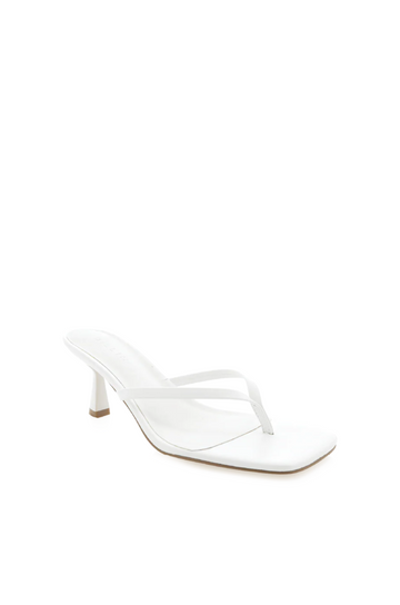 Xami is the perfect casual thong heel that will get you from work to the weekend. This on-trend style will be the perfect addition to your wardrobe.

low kicked-in stiletto heel
open square toe
thin thong toe straps
easy slip on design
open heel counter
synthetic upper, lining and outsole
Heel height: 2.56"
Synthetic
white kitten heel
white thong kitten keel