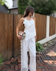 white Linen pant
Lace on sides and trim
Elastic waistband
Unlined
Partially sheer
hamptons east coast outfit