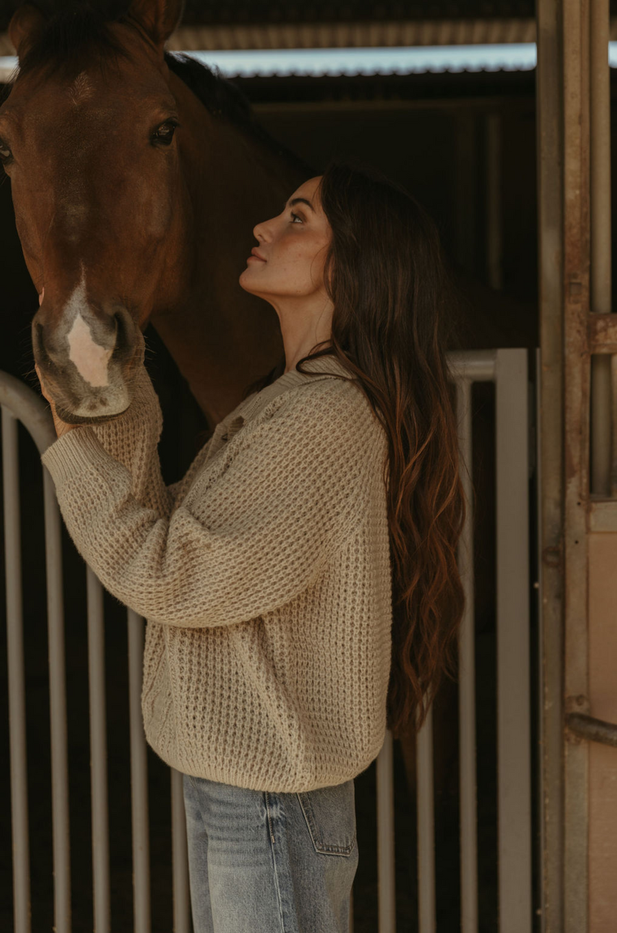 Fuzzy mixed knit crochet sweater. Collar neckline. Front button closures. Long sleeves. Banded hems. Unlined. tan sweater. knit sweater. quarter button up sweater