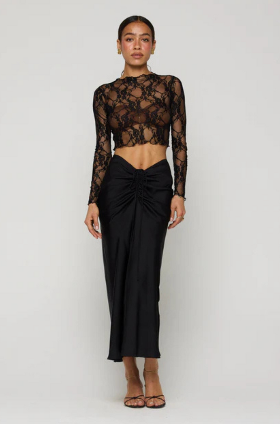 black Shirred maxi skirt
Elastic stretch waist with front tie cinch
Zipper up back closure
Polyester