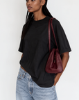 The fabric feels luxuriously soft and smooth against the skin, offering a breathable, lightweight comfort
Relaxed crew neckline
Cuffed sleeves
Length: 29.5"
50% cotton/50% modal butter jersey knit
black oversized basic tshirt top
