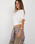 white Draped short sleeve top
Unlined
Length: 24"
Lyocell/Spandex