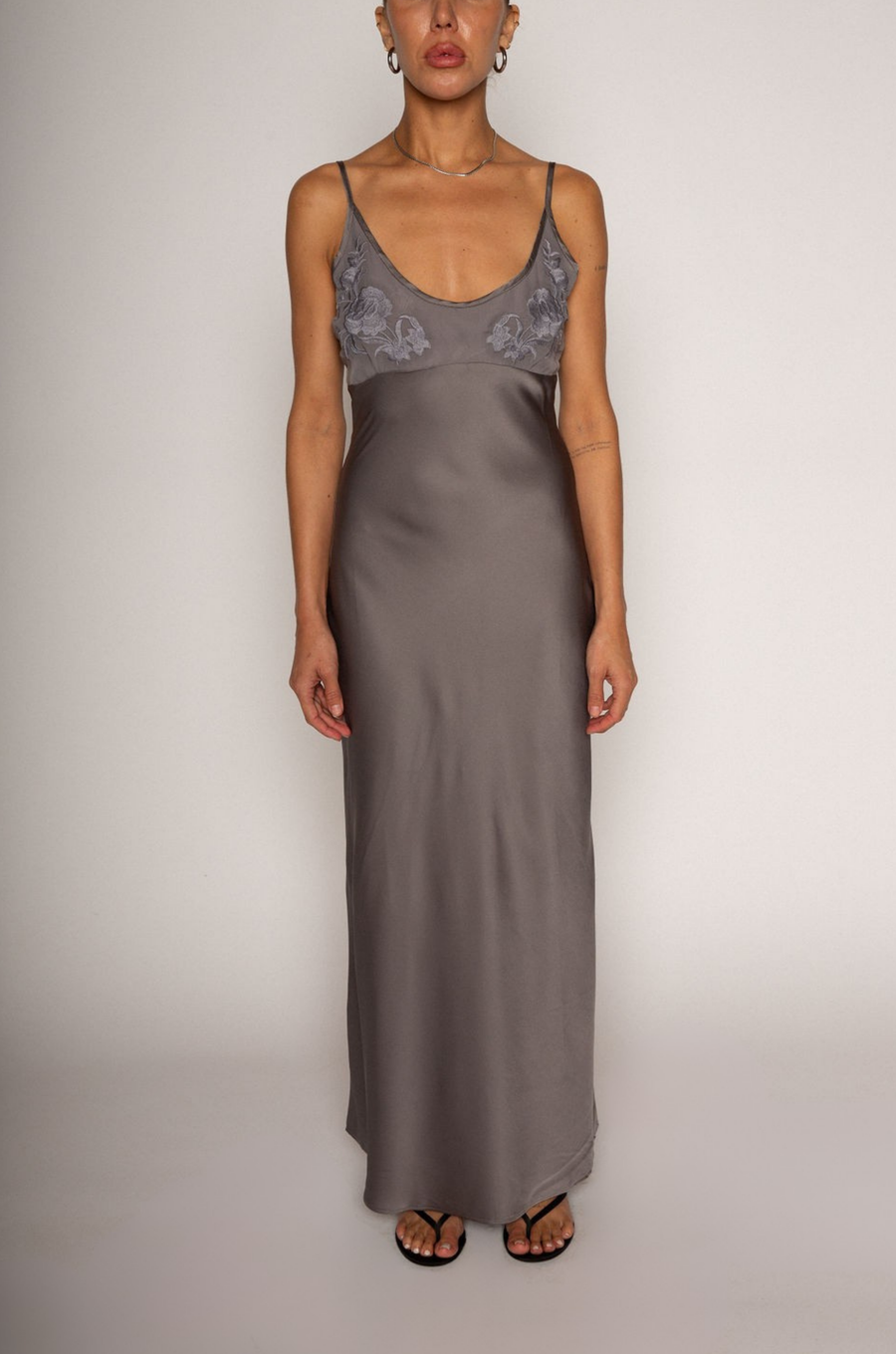 grey Satin maxi dress
Floral embroidered mesh bust
Adjustable straps
Side hook and eye and zipper closures
Unlined