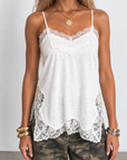 Cream Satin tank top
Lace detailing
Adjustable spaghetti straps
Side slits
Unlined/Partially sheer