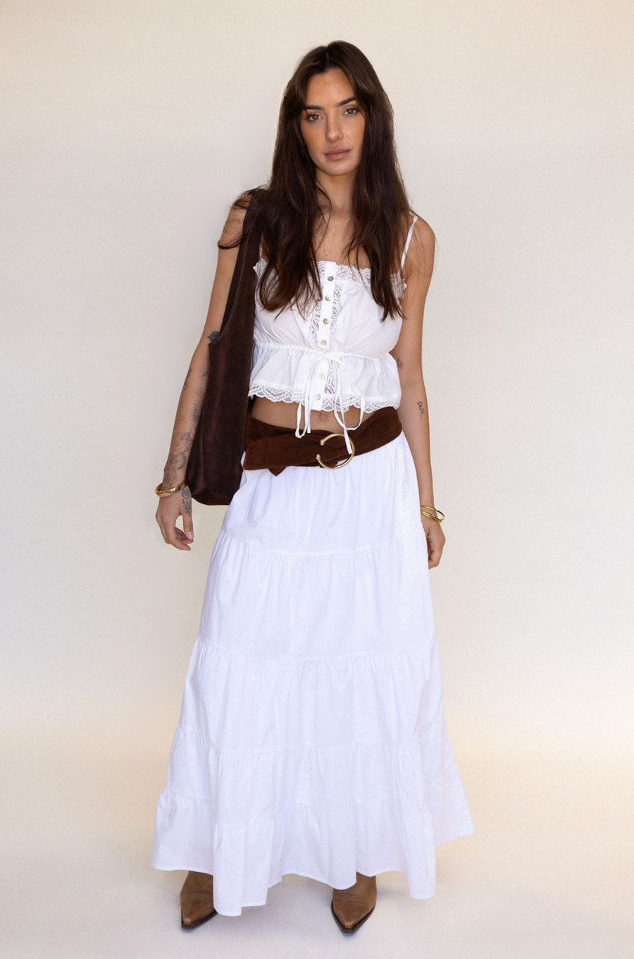 white Button down tank top
Lace trim
Adjustable front tie
Sleeveless
Straight neckline
Adjustable straps
summer tank top
country side tank top