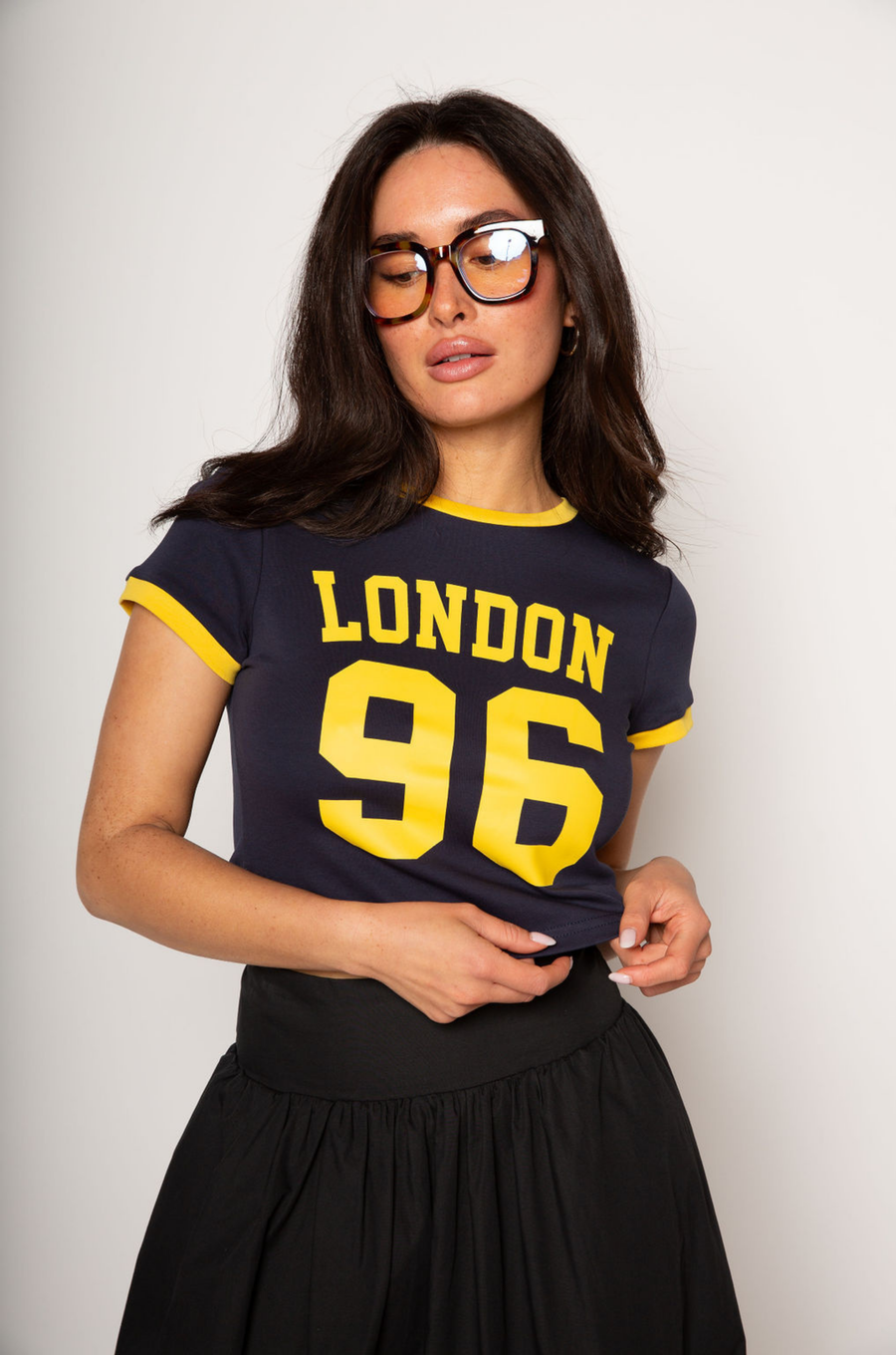 Graphic printed knit crop ringer tee. Crewneck. Short sleeves. Unlined. london graphic tee. baby crop tee