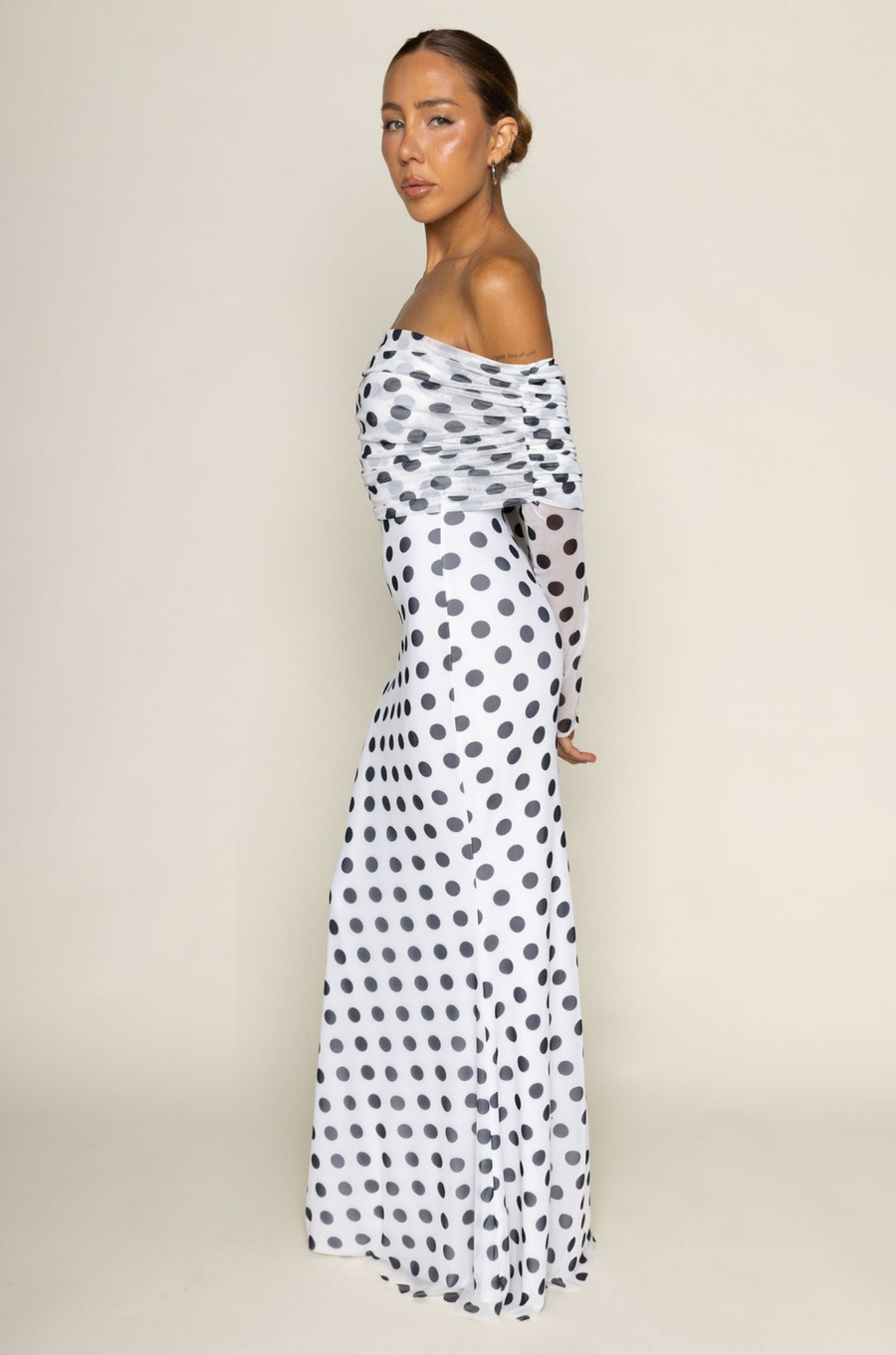 Polka dot mesh long sleeve maxi dress
Off the shoulder silhouette
Gathered detailing
white polka dot maxi dress