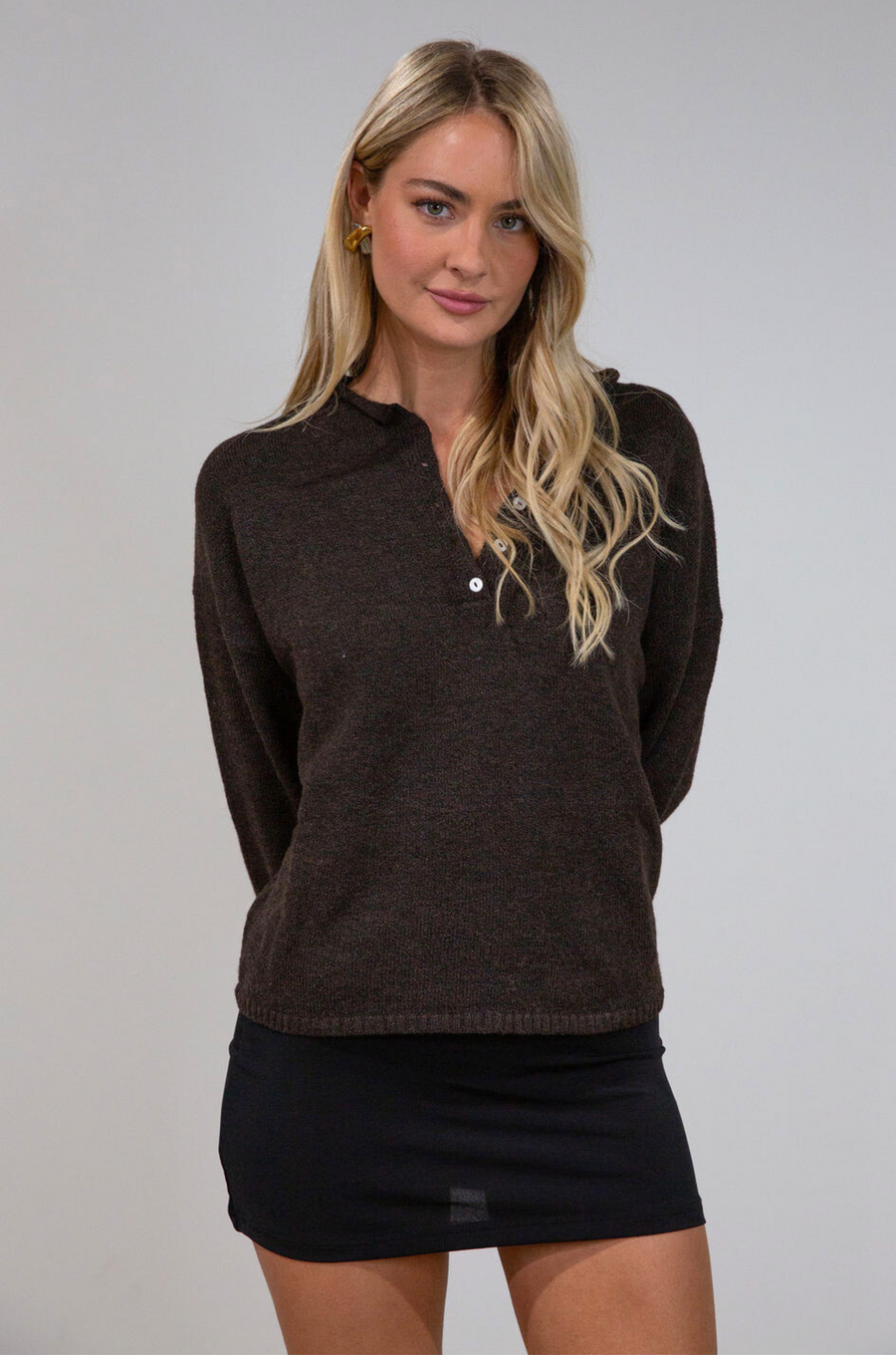 Fuzzy heather crochet knit sweater. Henley quarter neckline with button down closures. Long sleeves. Unlined. brown pullover. brown sweater. fall sweater. fall outfit