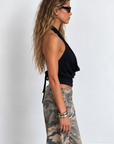 black Chiffon halter top
Cowl neck
Side zipper closure
Adjustable back tie
Unlined/Sheer