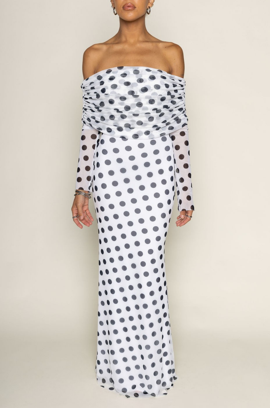 Polka dot mesh long sleeve maxi dress
Off the shoulder silhouette
Gathered detailing
white polka dot maxi dress