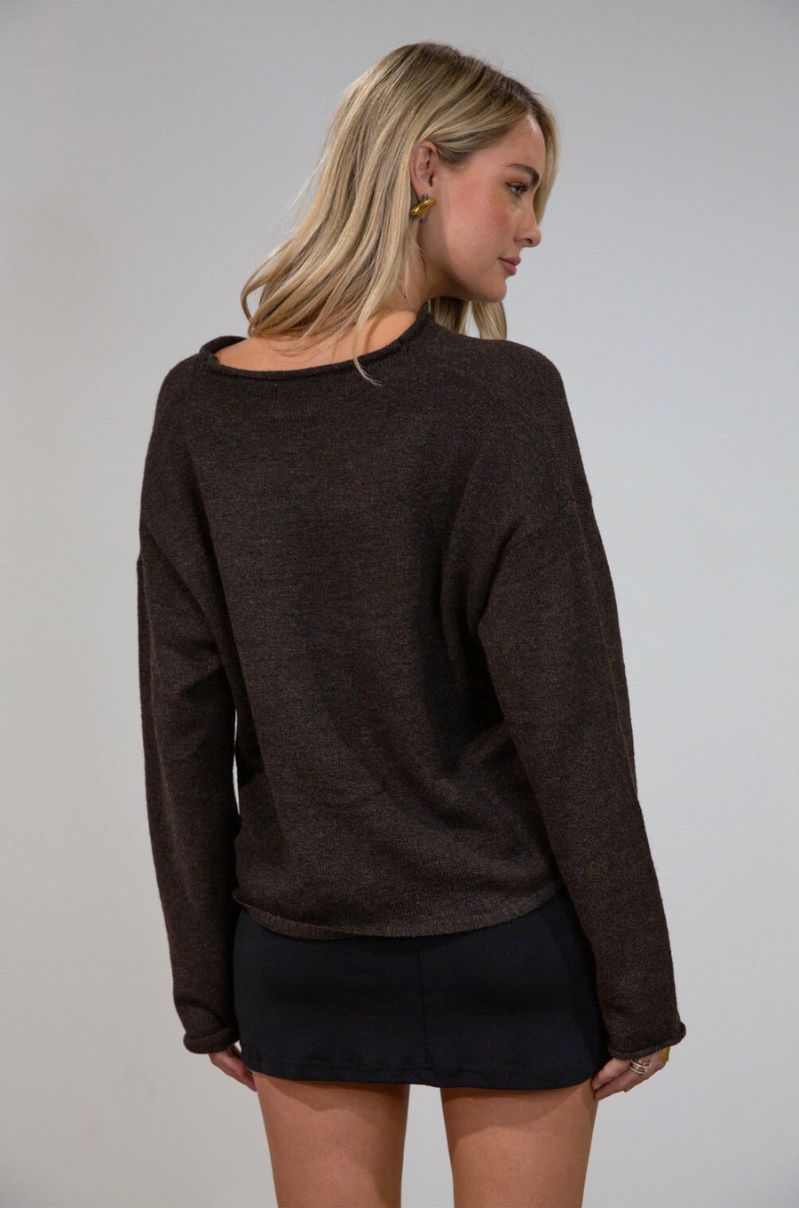 Fuzzy heather crochet knit sweater. Henley quarter neckline with button down closures. Long sleeves. Unlined. brown pullover. brown sweater. fall sweater. fall outfit