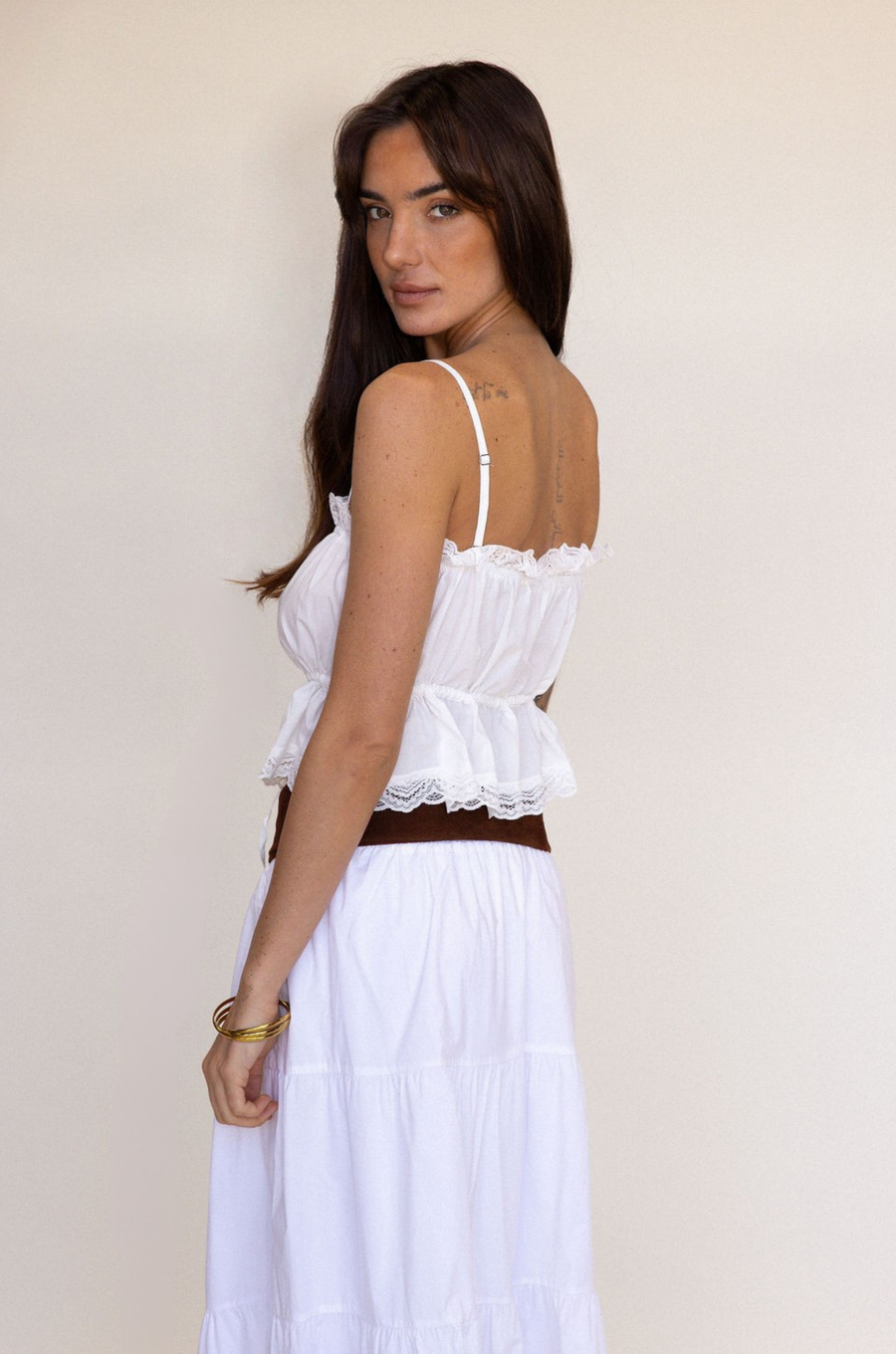 white Button down tank top
Lace trim
Adjustable front tie
Sleeveless
Straight neckline
Adjustable straps
summer tank top
country side tank top