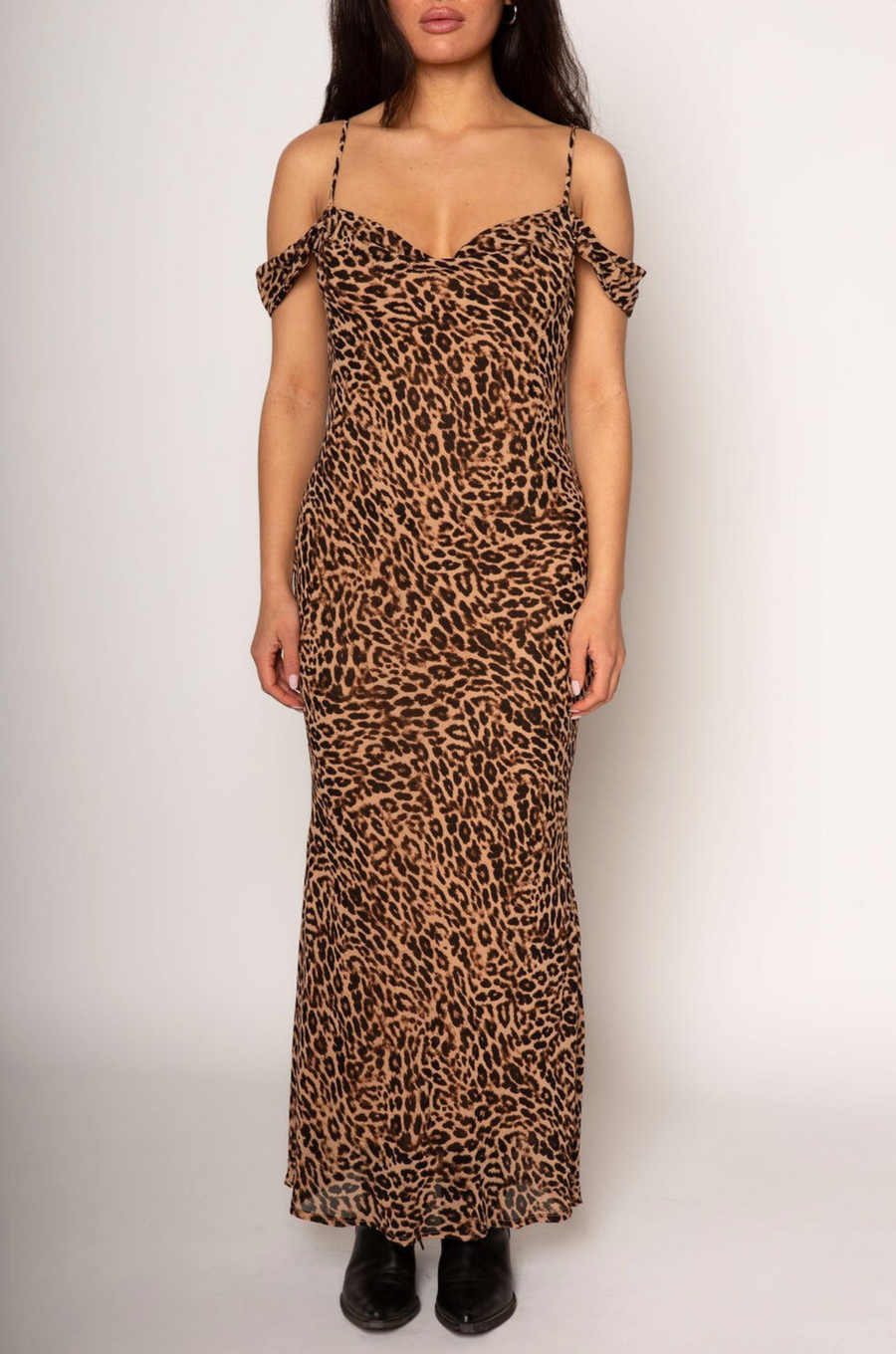 Animal printed chiffon maxi dress. Adjustable straps. Off the shoulder sleeves. Back tie closure. Fully lined. leopard print maxi dress. fall dress. sporing dress. summer dress