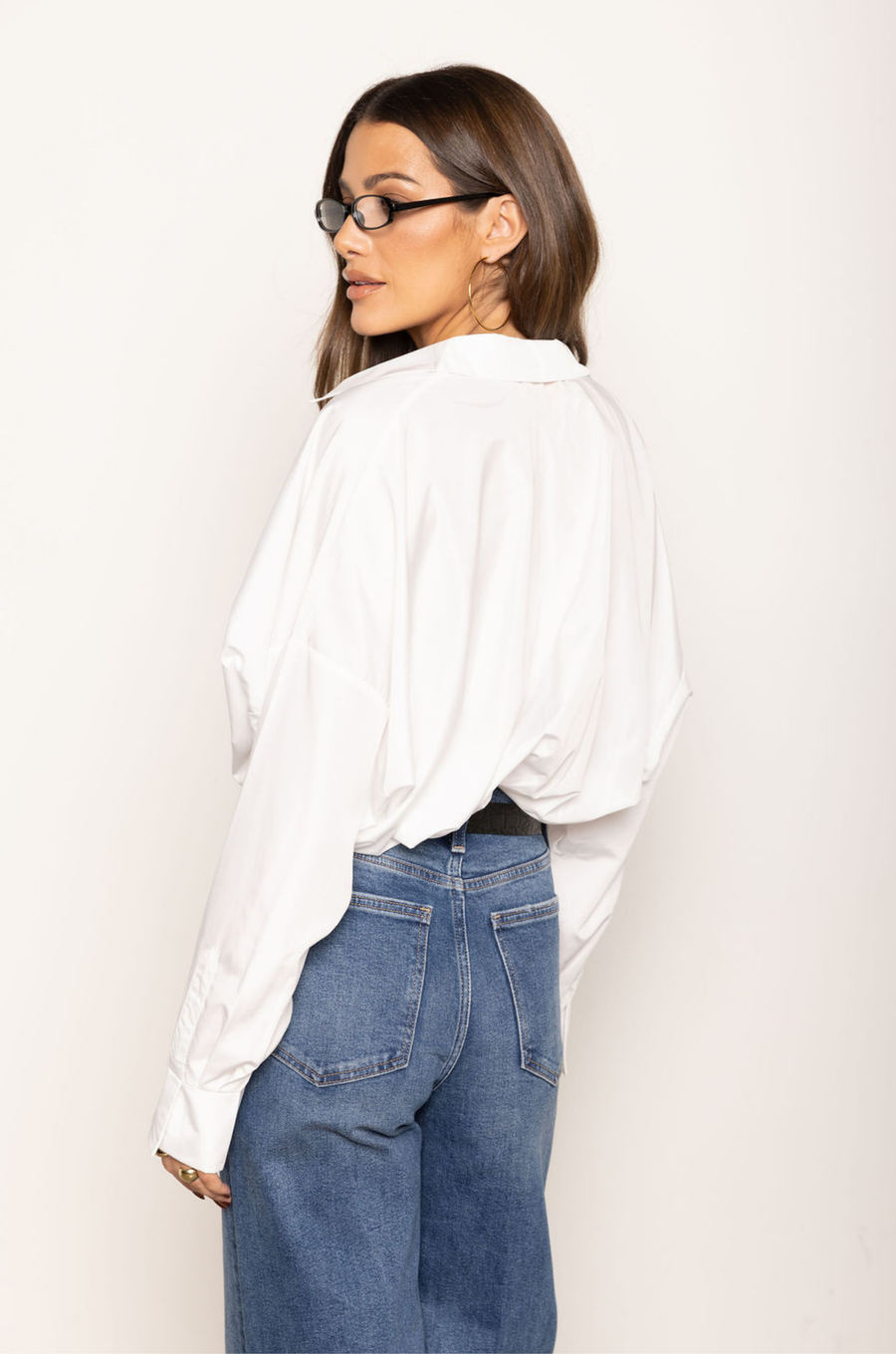 Long sleeve bodysuit
Collared
Deep v neckline with snap button closure
Bottom snap closure
Unlined
white deep v bodysuit