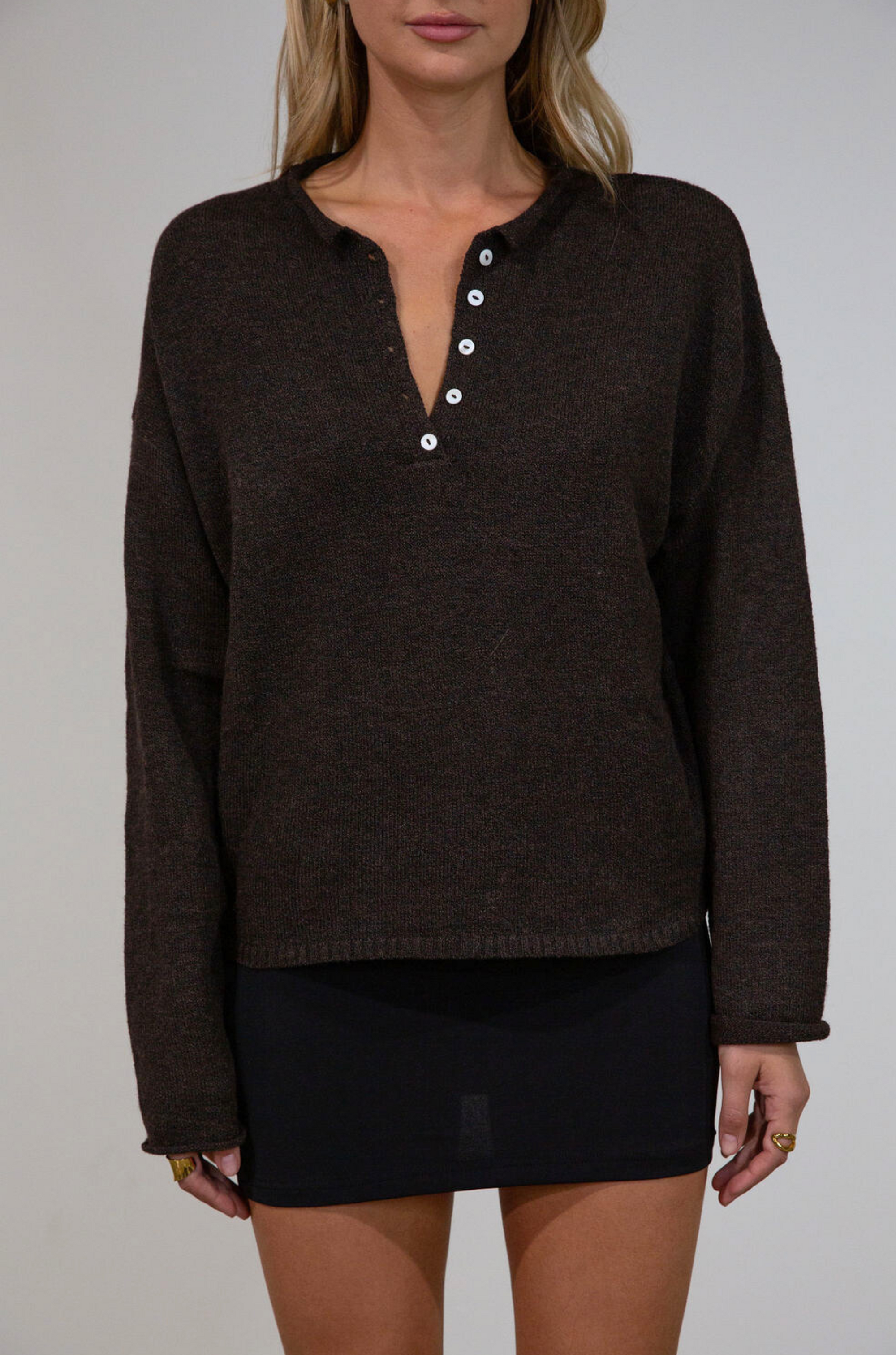 Fuzzy heather crochet knit sweater. Henley quarter neckline with button down closures. Long sleeves. Unlined. brown pullover. brown sweater. fall sweater. fall outfit
