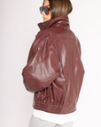 Faux leather oversized jacket
Zipper/button closure
Collared
2 side pockets
Elastic hem
Lined
oversized burgundy faux leather jacket