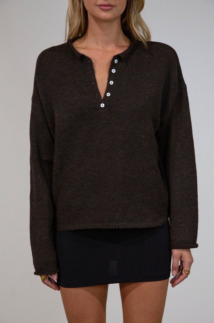 Fuzzy heather crochet knit sweater. Henley quarter neckline with button down closures. Long sleeves. Unlined. brown pullover. brown sweater. fall sweater. fall outfit