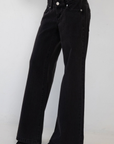 black Super low-rise waist jeans that sits right on your hips
These jeans hug your butt and thighs before flaring from hip to hem for that full-leg moment
Cut lower at the front with added coverage at the back
Cotton/Recycled Cotton