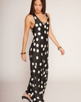 Satin polka dot maxi dress
Scoop neckine
Strapless
Side zipper closure
Unlined
Black and white polka dot maxi dress