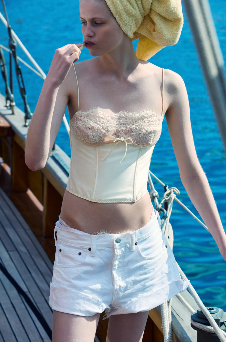 cream Sleek satin bustier with lace detailing
Fully boned bodice
Adjustable lace-up back
Skinny tie bow
Rosette adornments
Lined at cups
Adjustable shoulder straps
Polyester/Elastane
cream ligneire bustier top