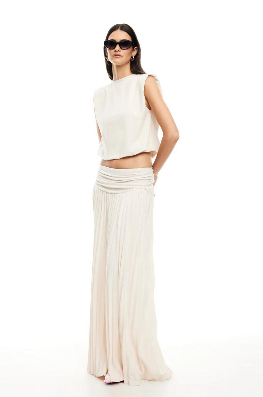 Knit maxi skirt. Elastic wide waistband. Pleated skirt. Fully lined. Slightly sheer. white mxi skirt. white lioness skirt. 
