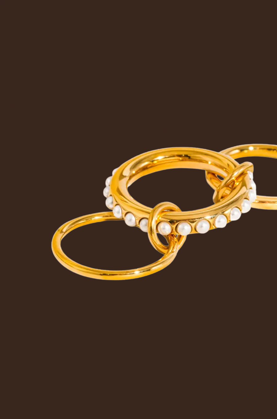 18K Gold Non-Tarnish Multi Stack Pearl Band Ring
18K Gold Plating
Stainless Steel
Size 8 Measurement: 0.714 Diameter/2.24 Circumference
Lead-free
Nickel-safe
Hypoallergenic
Water Resistant