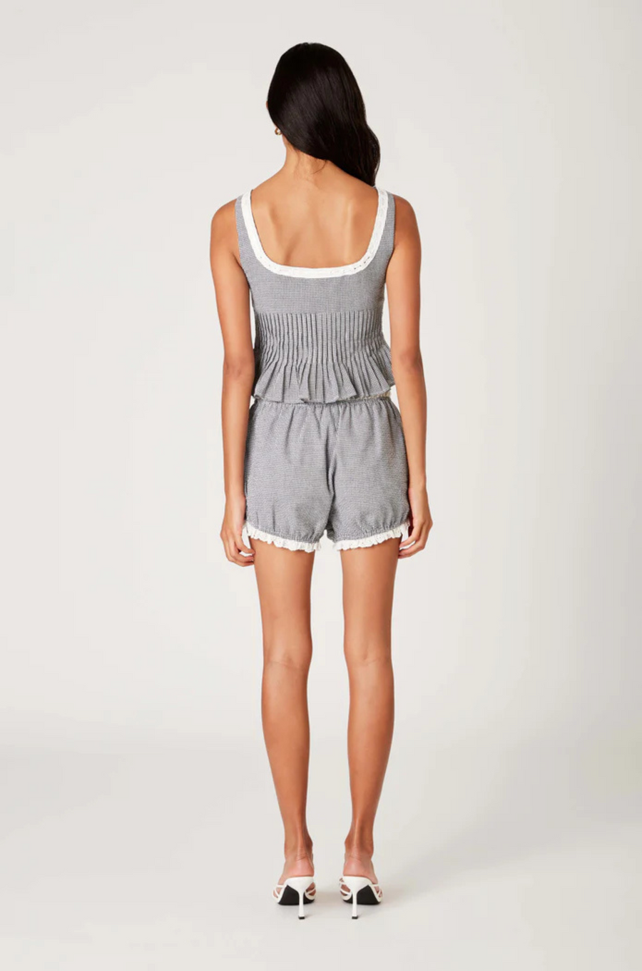 Gingham printed bloomer shorts
Elastic waistband with delicate bow detail
Eyelet lace trim
Fully lined
black and white gingham bloomer shorts