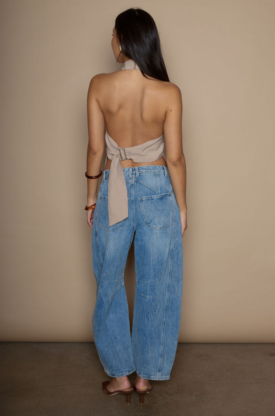 Barrel leg jeans. Button fly. Five pocket construction. Unlined. medium wash jeans. 