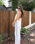 white Linen pant
Lace on sides and trim
Elastic waistband
Unlined
Partially sheer
hamptons east coast outfit